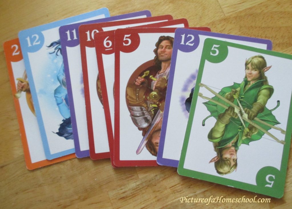 dragonwood card and dice game with dragons and mythical creatures card spread
